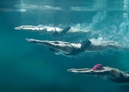 three swimmers