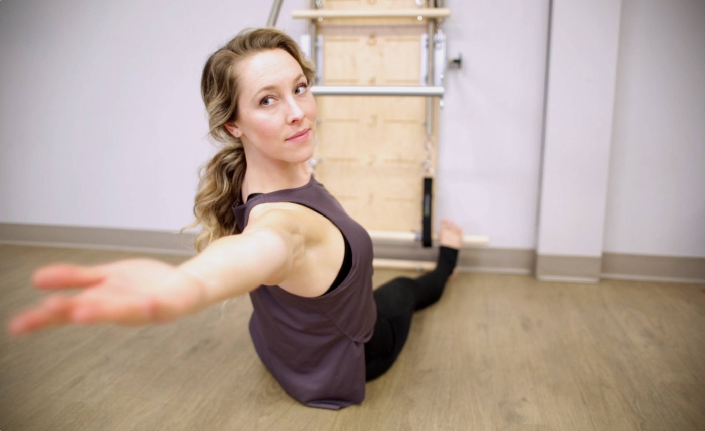 woman using Pilates Springboard