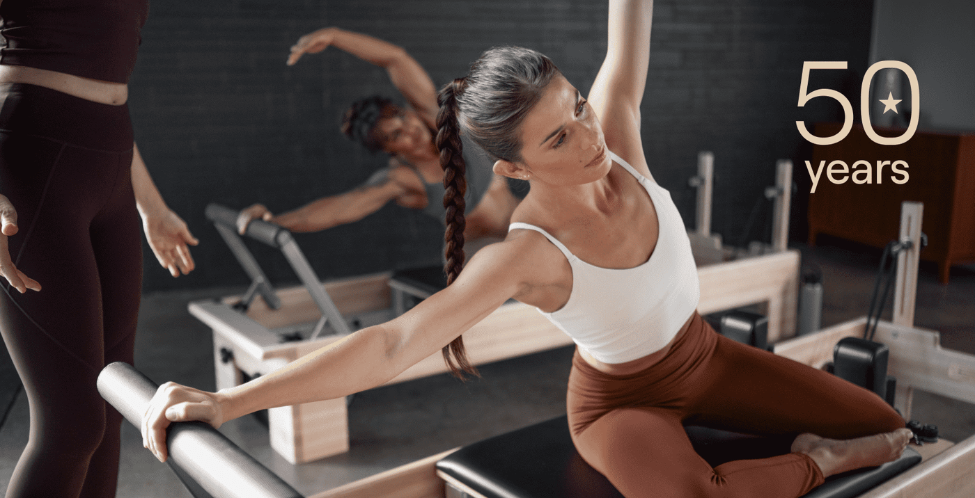 people side bending on pilates reformers